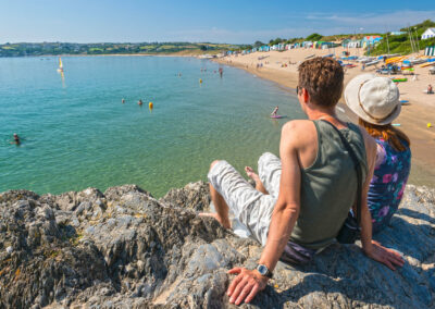 Couple overlooking Abersoch beach Llyn Peninsula North Wales